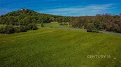 Stavební pozemek o velikosti 5 635 m2 pod hradem Vysoký Chlumec, cena 4099000 CZK / objekt, nabízí 