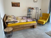 Pronájem moderního vybaveného apartmánu 1+kk s terasou v srdci Jizerských hor, cena 17000 CZK / objekt / měsíc, nabízí 