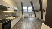 Pronájem podkrovního bytu 2+kk v Chebu, 64 m2, cena 15000 CZK / objekt / měsíc, nabízí ERA Estate Agency