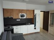 Pronájem cihlového bytu 1+kk včetně parkovacího stání v Olomouci na ulici Jánského, cena 12000 CZK / objekt / měsíc, nabízí 