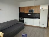 Pronájem cihlového bytu 1+kk včetně parkovacího stání v Olomouci na ulici Jánského, cena 12000 CZK / objekt / měsíc, nabízí 