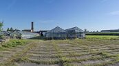 Pozemky o výměře 11.704 m2 v Holicích (bývalý zemědělský areál), cena 7900000 CZK / objekt, nabízí 