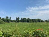 Prodej stavebního pozemku cca 11.000 m2 v obci Opava-Komárov, okres Opava, cena 2700 CZK / m2, nabízí 