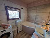 Novostavba finského srubového domu u Mnichova Hradiště a Mladé Boleslavi.