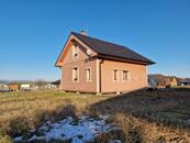 Novostavba finského srubového domu u Mnichova Hradiště a Mladé Boleslavi.