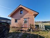 Novostavba finského srubového domu u Mnichova Hradiště a Mladé Boleslavi.