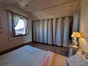 Novostavba finského srubového domu u Mnichova Hradiště a Mladé Boleslavi.