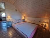 Novostavba finského srubového domu u Mnichova Hradiště a Mladé Boleslavi.