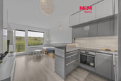 Prodej bytu 1+kk/b, 33 m2, gar. stání, Praha 9, Hostavice, cena 6450000 CZK / objekt, nabízí M&M reality holding a.s.