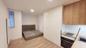 Pronájem, P-10, Strašnice, 1+KK, 22,88 m2, 1.NP/3NP, novostavba, zařízené, cena 13500 CZK / objekt / měsíc, nabízí 