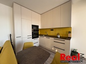 Pronájem novostavby 1+kk, sklep, lodžie, garážové stání, CP 37m2 + garážové stání, Střelice, Brno - venkov, cena 13700 CZK / objekt / měsíc, nabízí 