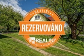Prodej pozemku o velikosti 1 726 m2 se zahradní chatou v Orlové - Lutyni, cena 1 CZK / objekt, nabízí 
